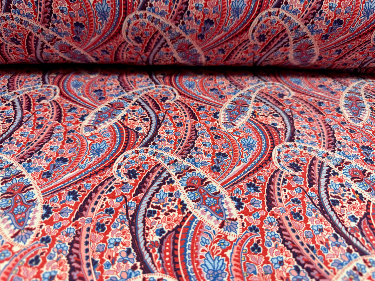 Soft touch stretch spandex single jersey fabric, per metre - paisley print - red & blue