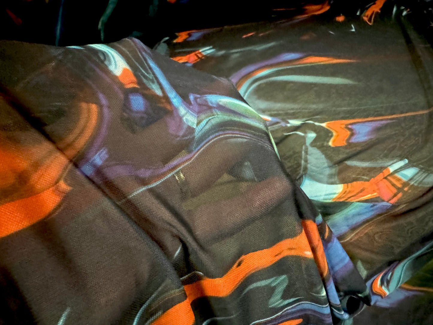 Power mesh net stretch spandex fabric, per metre - oil spill print - darkest teal