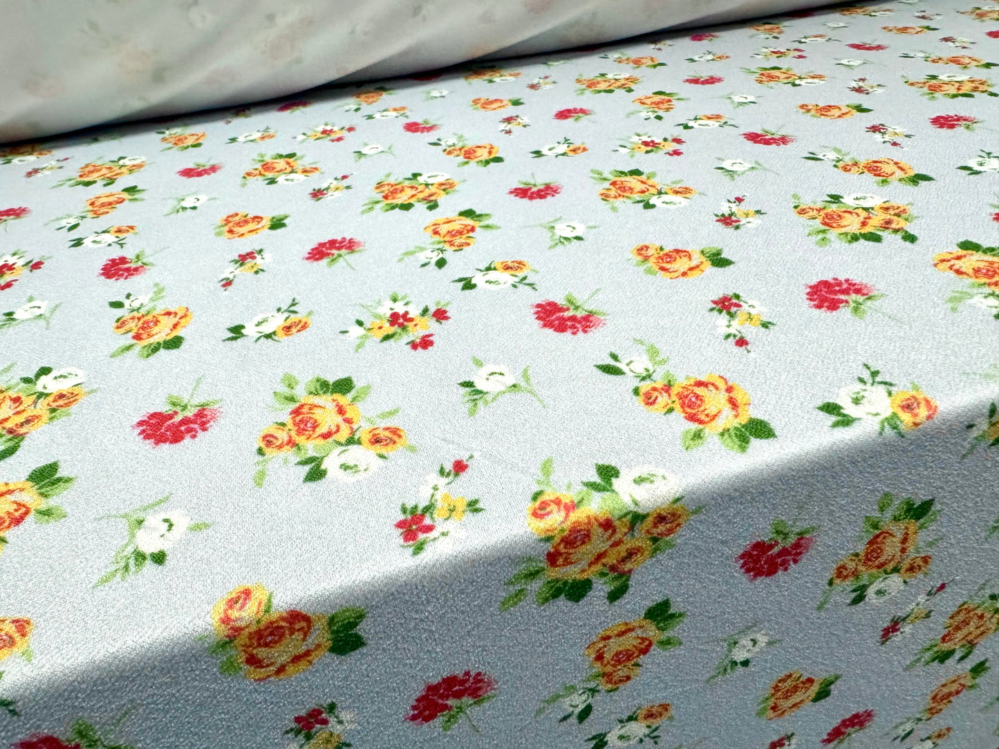 Valentino crepe spandex jersey fabric - similar to scuba - per metre - ditsy flowers print - Sky blue & Orange