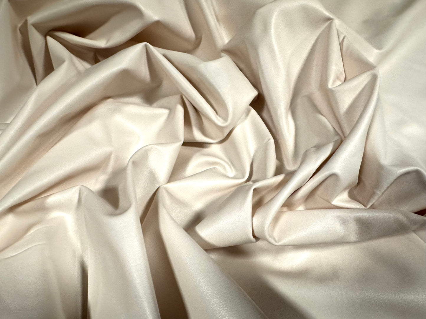 Stretch pvc spandex jersey leather look fabric, per metre - cream