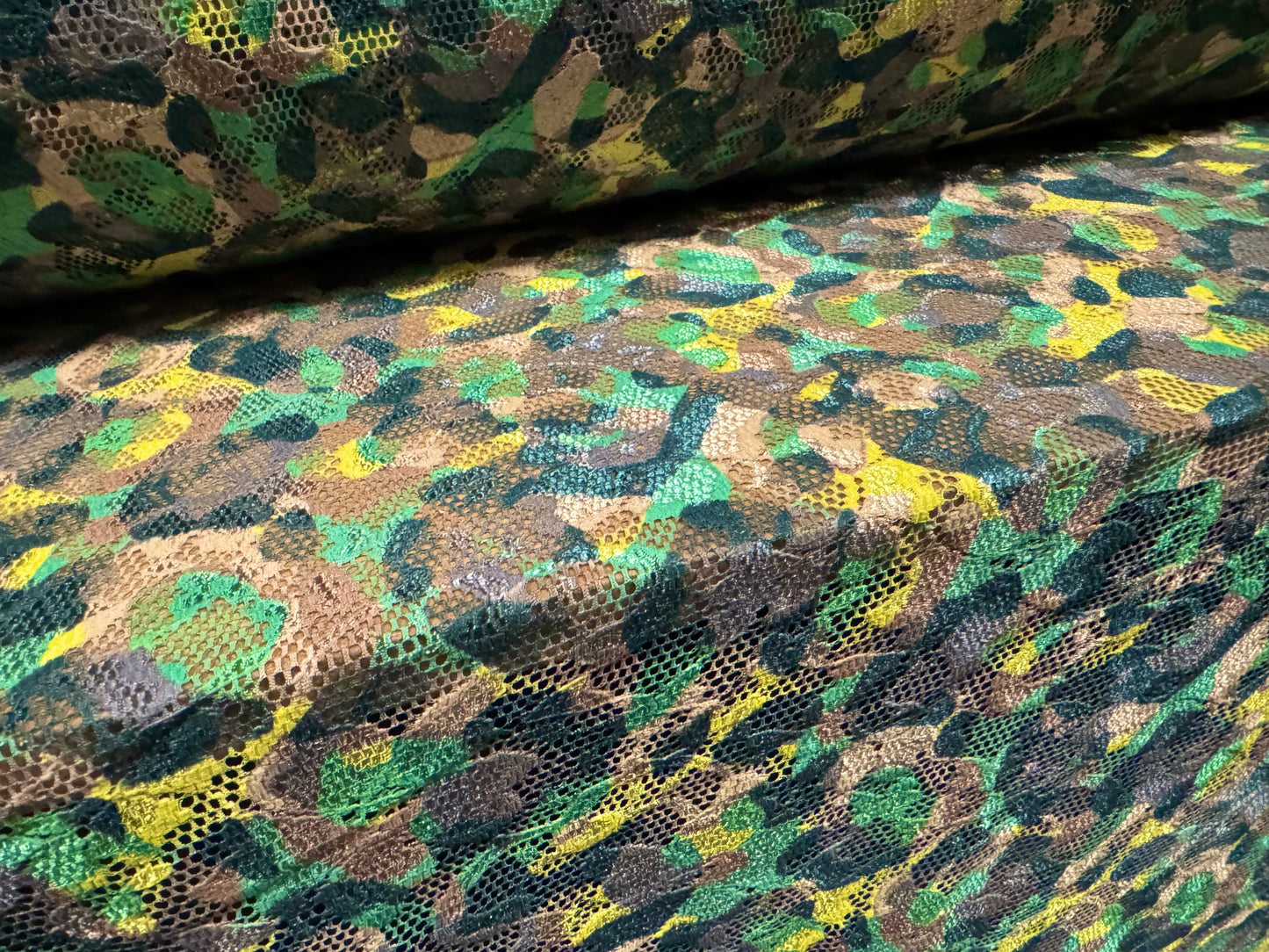 Stretch spandex lace fabric, per metre - stylised animal print - green & yellow