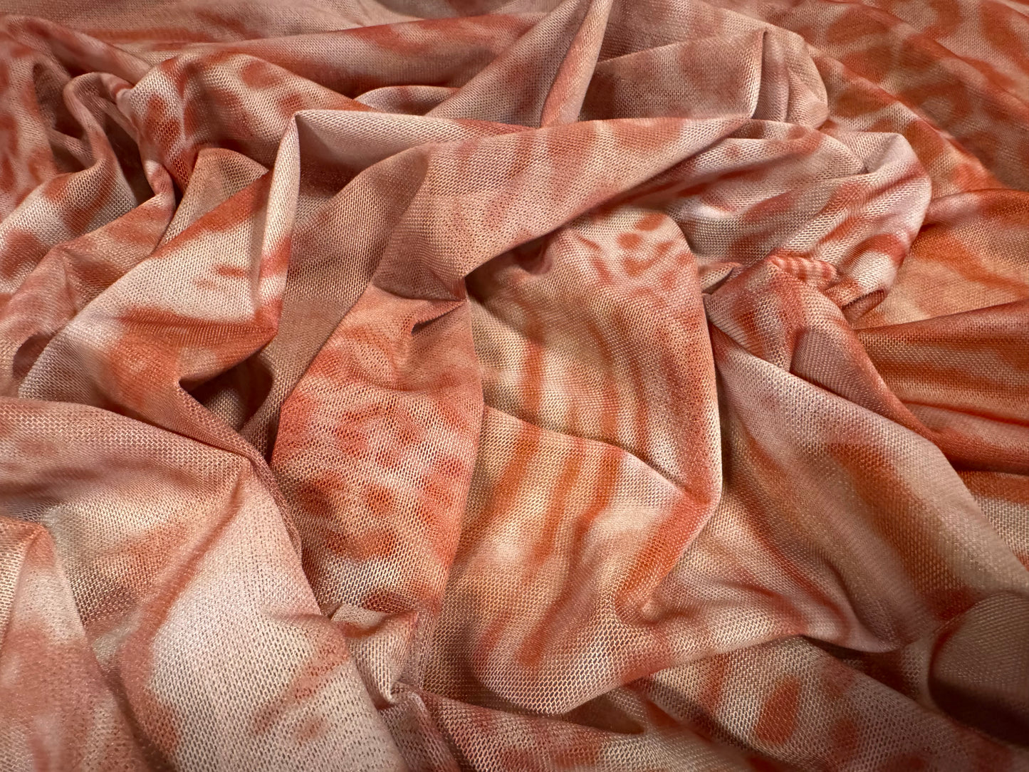 Power mesh net stretch spandex fabric, per metre - animal fusion print - dusky pink & coral
