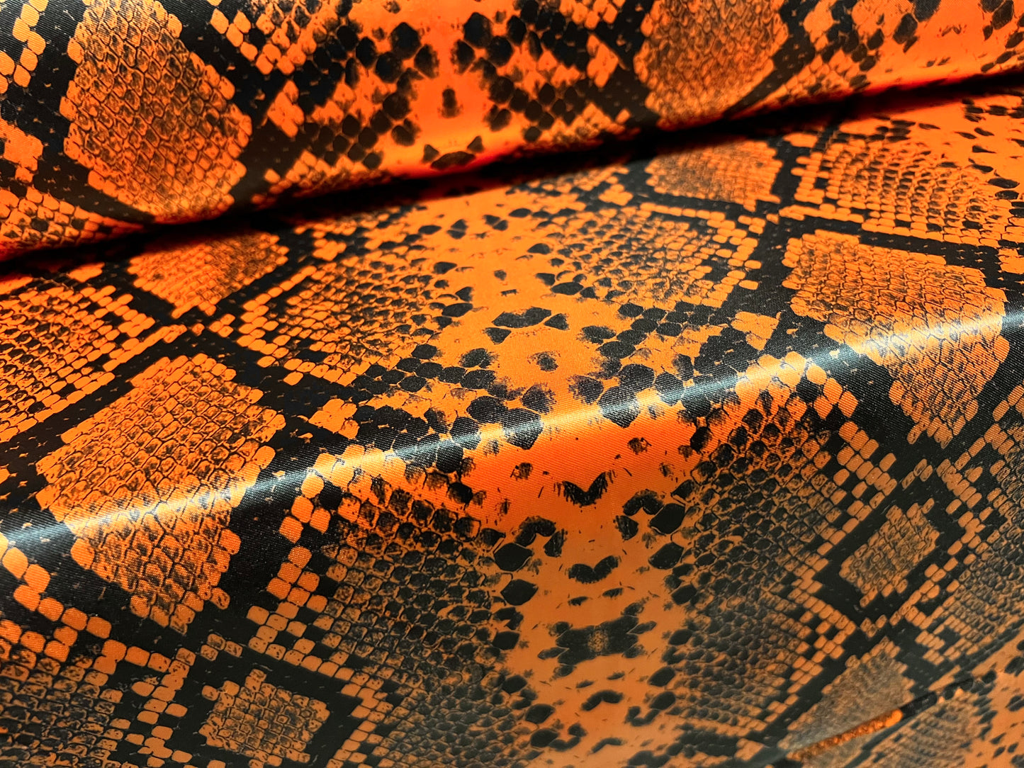 Silky Satin woven dress fabric, per metre - snakeskin animal print - orange