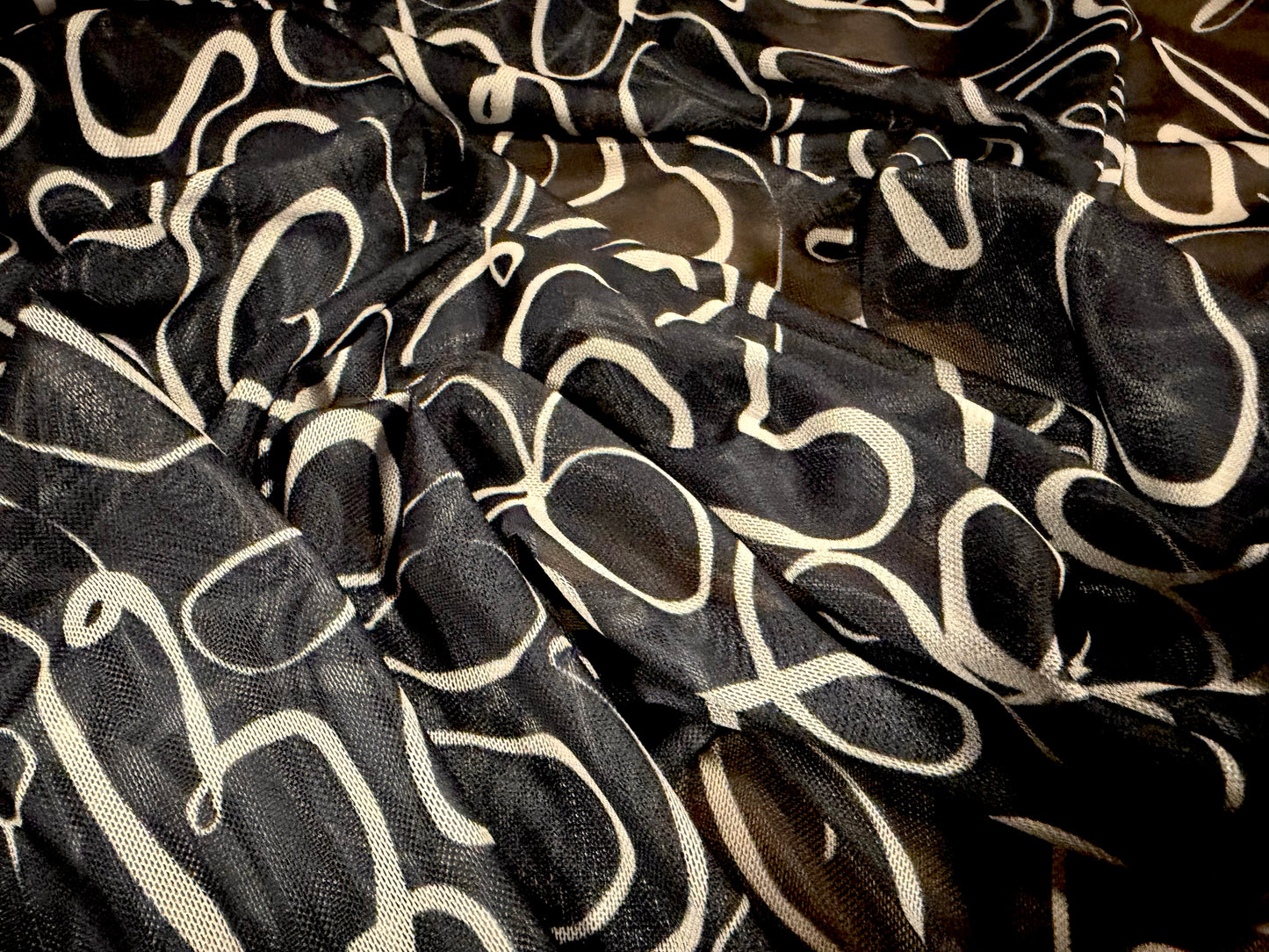 Power mesh net stretch spandex fabric, per metre - doodle print - black & stone