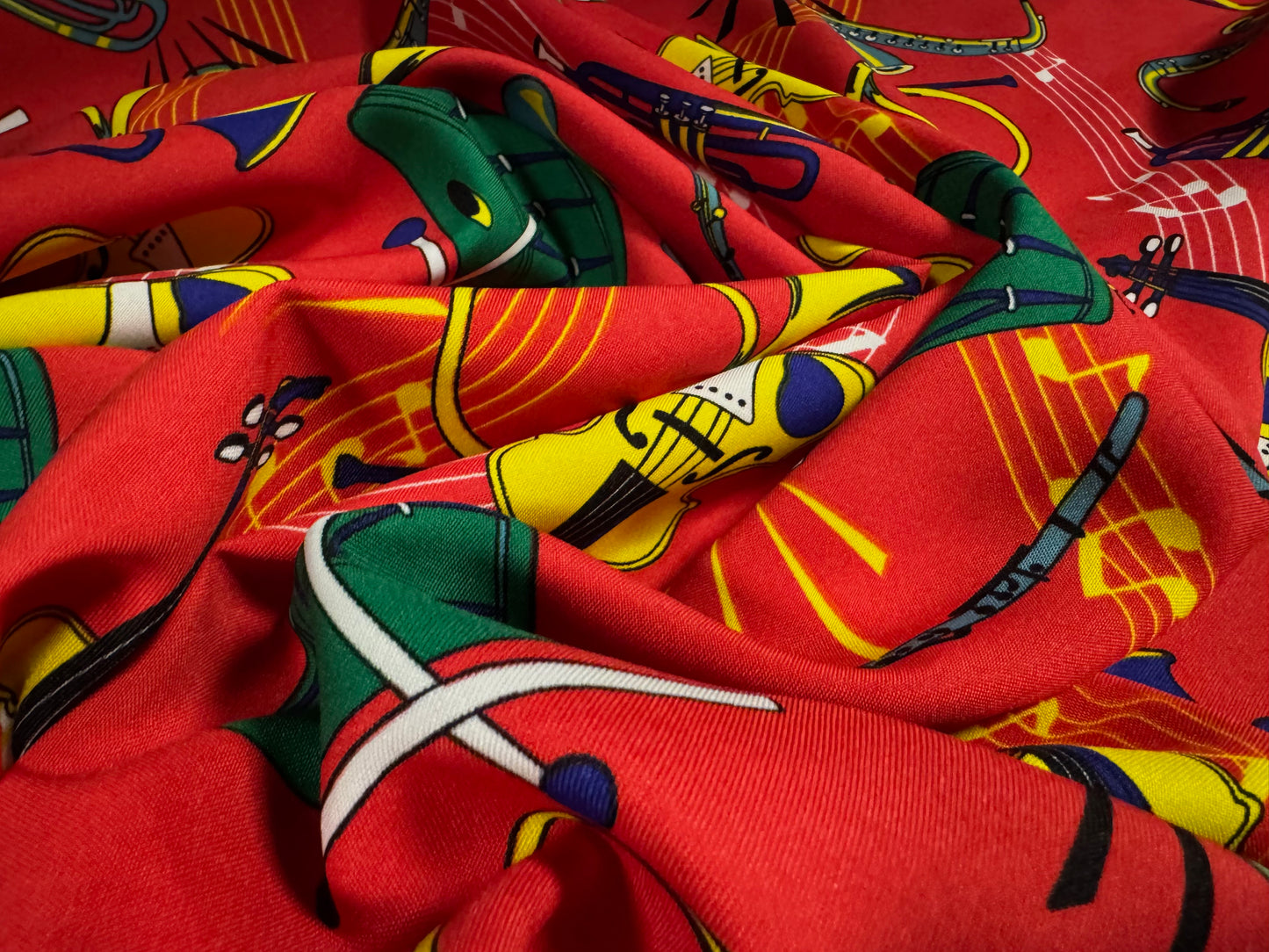 Woven Panama fashion fabric, per metre - musical instruments print - red