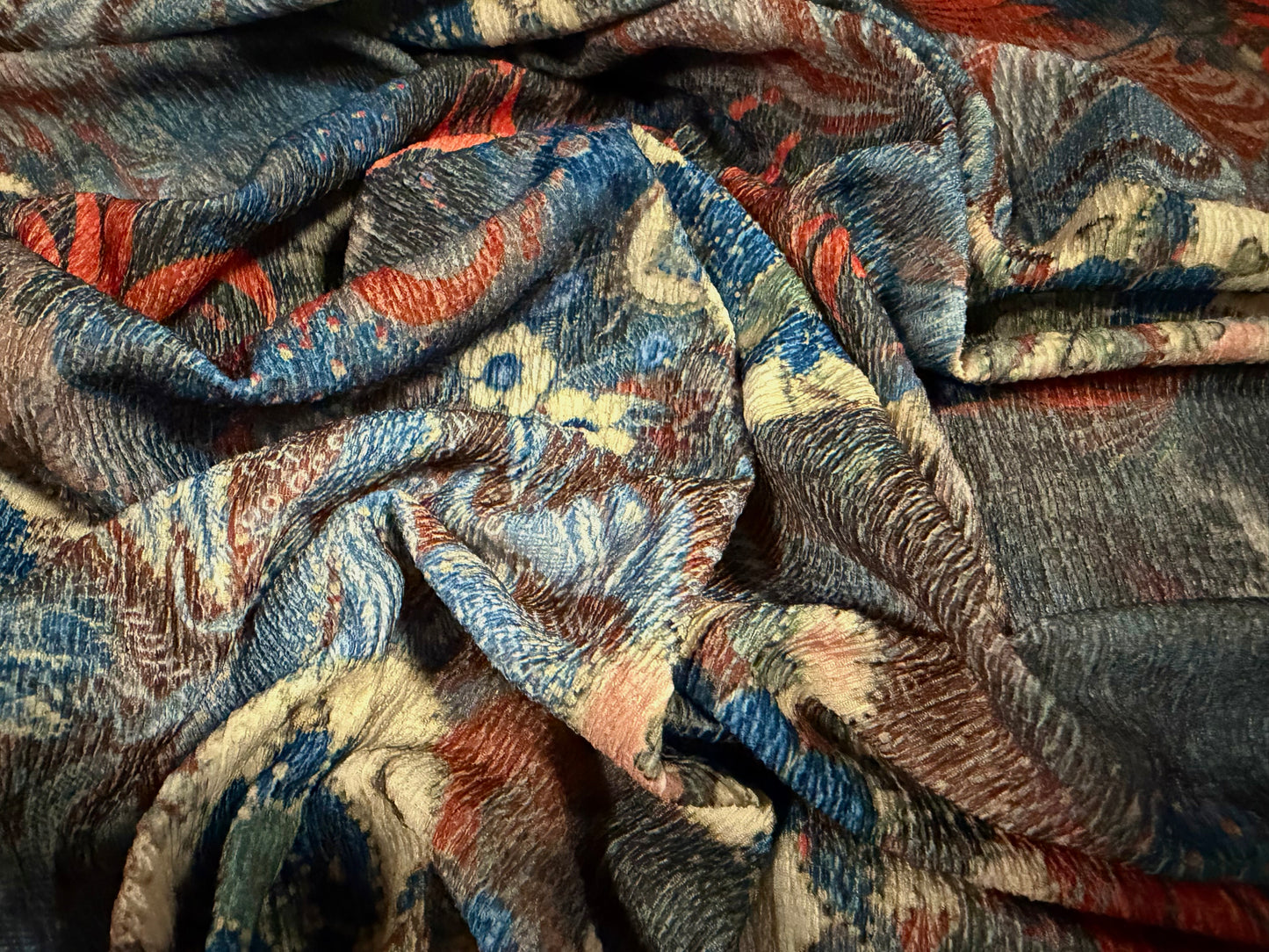 Crinkle crepe stretch woven fabric, per metre - paisley floral print - washed denim & orange