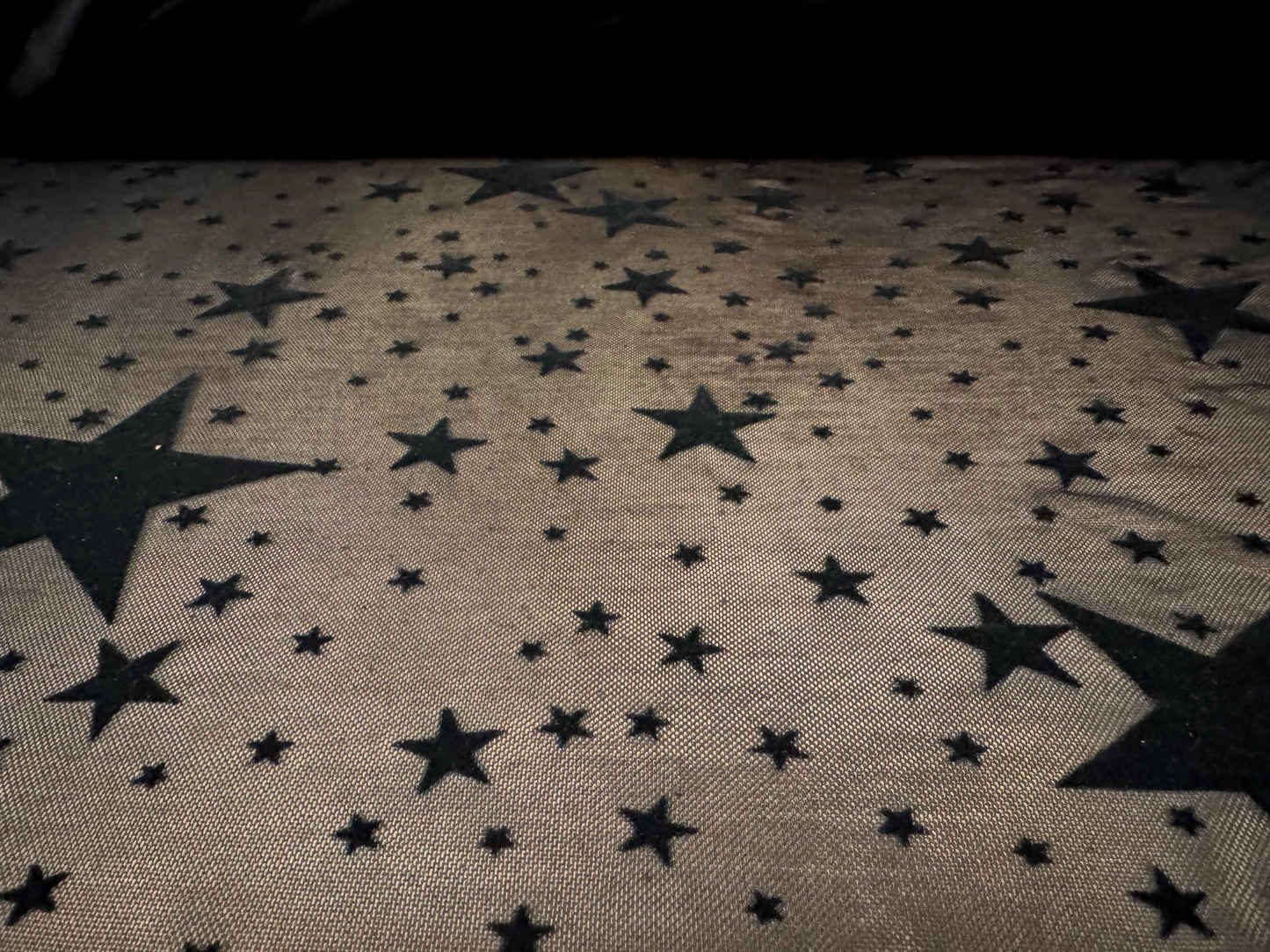 Power mesh net sheer stretch spandex fabric, per metre - flocked stars print - black on black