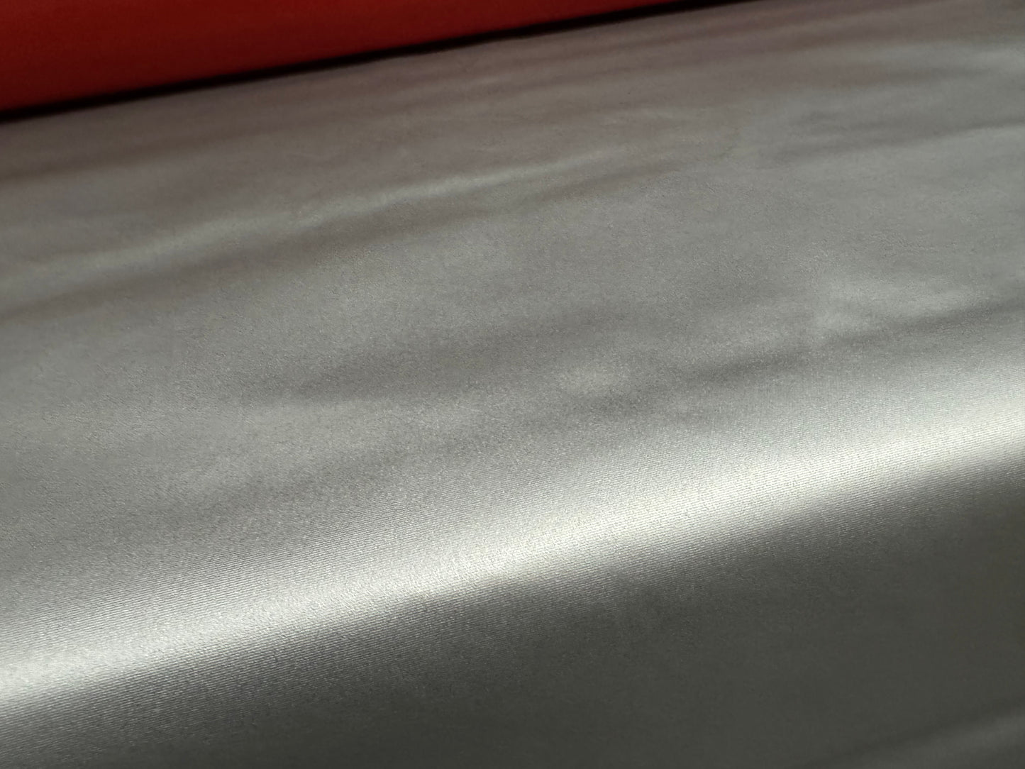 Metallic coated nylon fabric, per metre - plain - silver on red