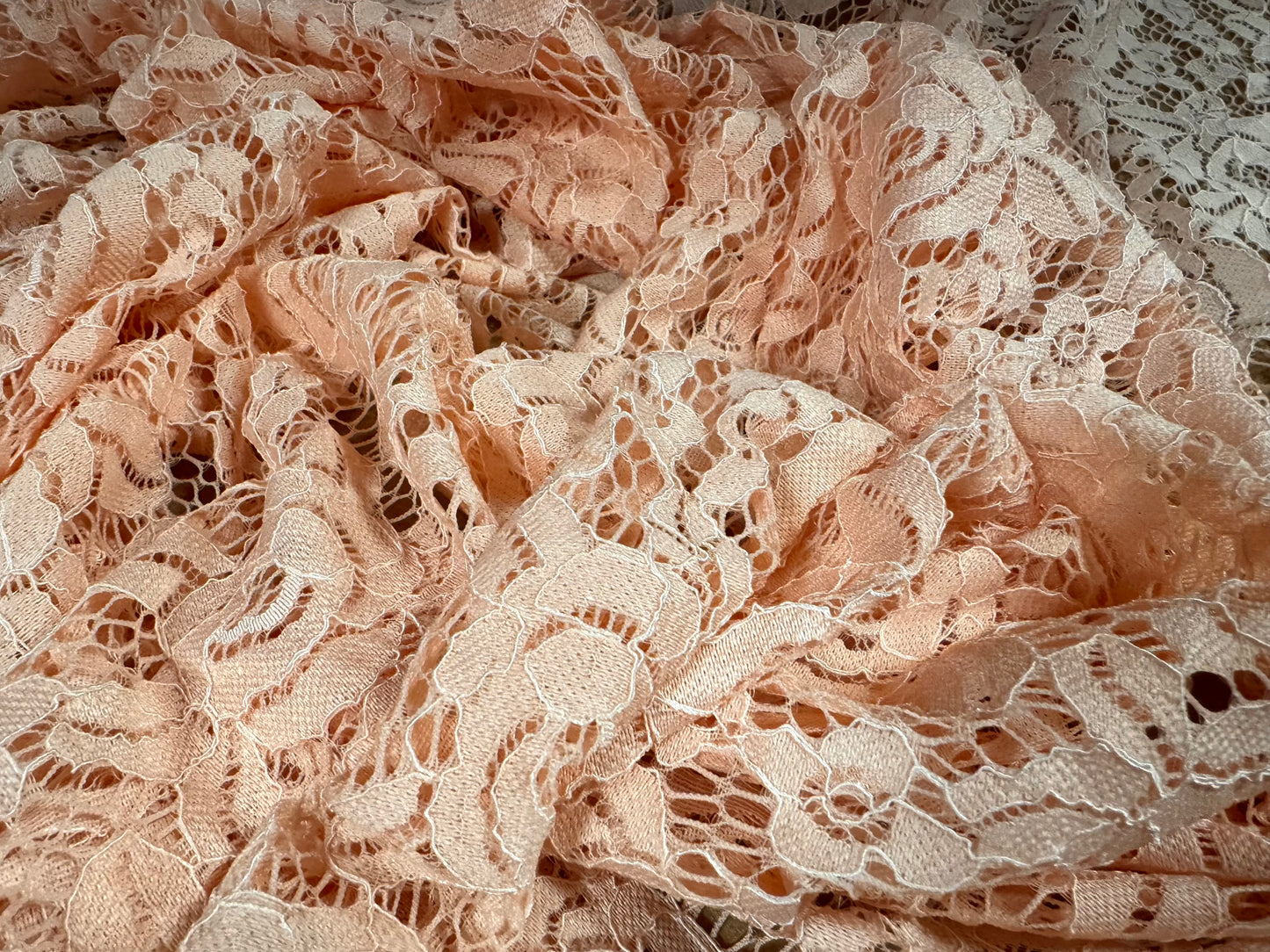 Corded stretch lace dress fabric, per metre - scalloped selvedge - floral - warm pink