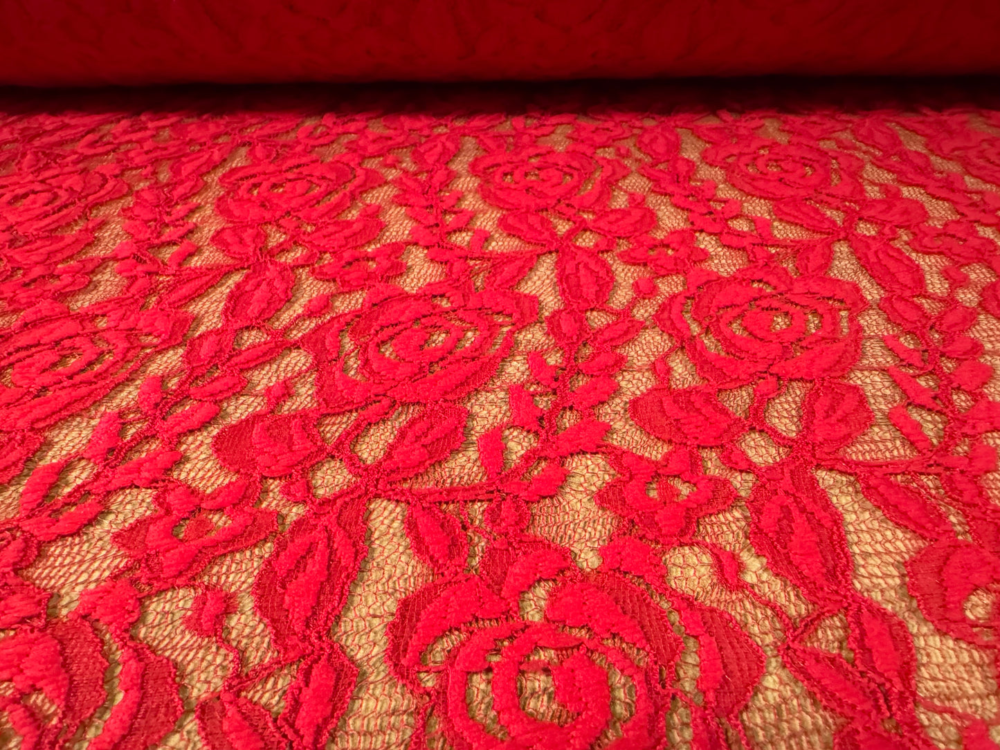 Stretch lace dress fabric, per metre - rambling rose floral design - red