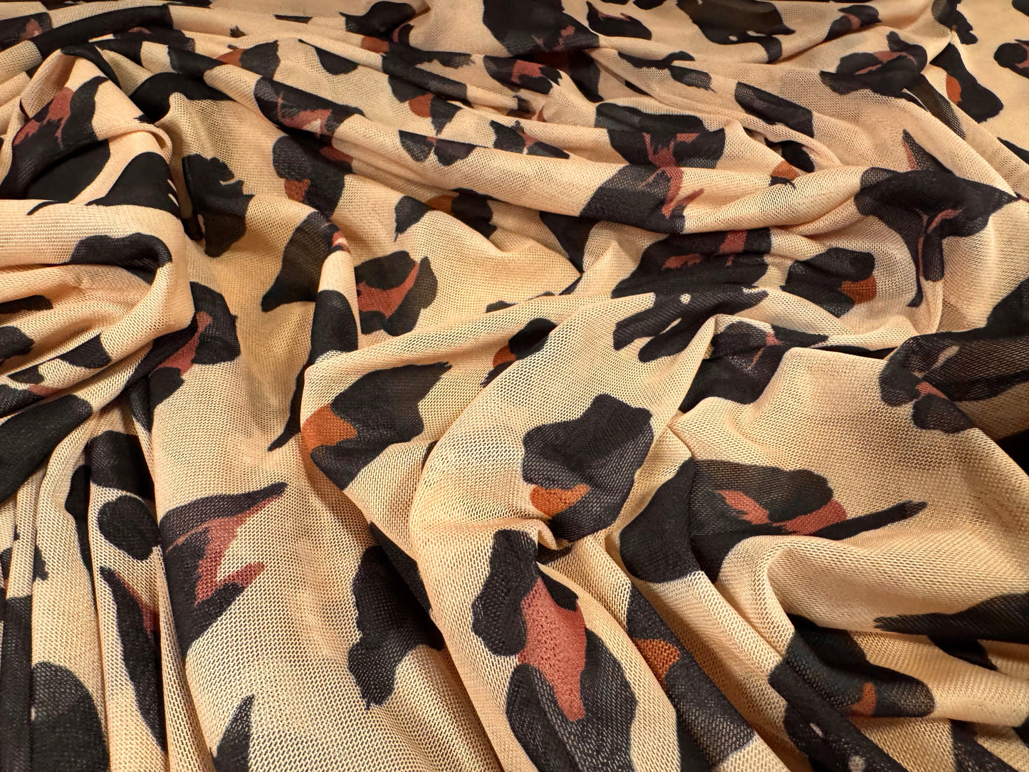 Power mesh net stretch spandex fabric, per metre - animal print - peach cream