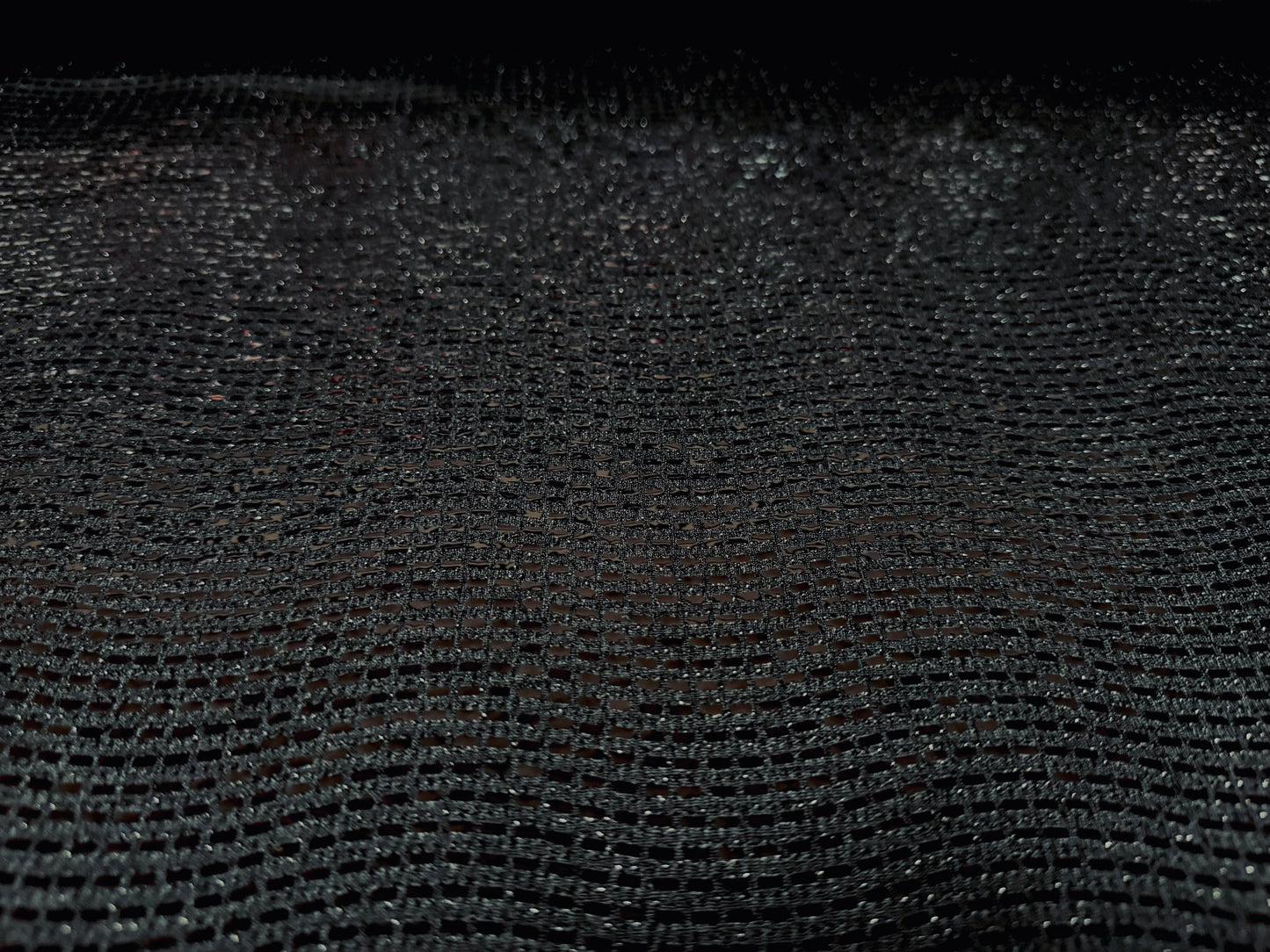 Metallic slinky stretch spandex jersey fabric, per metre - sequin wave design - black on black
