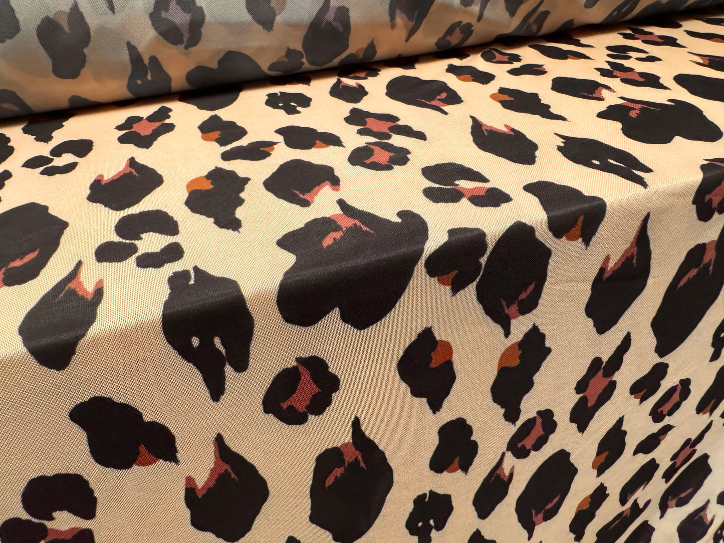 Power mesh net stretch spandex fabric, per metre - animal print - peach cream