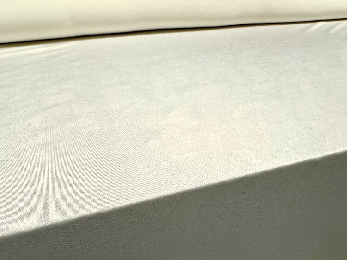 Soft touch spandex stretch jersey dress fabric, per metre - plain - ivory