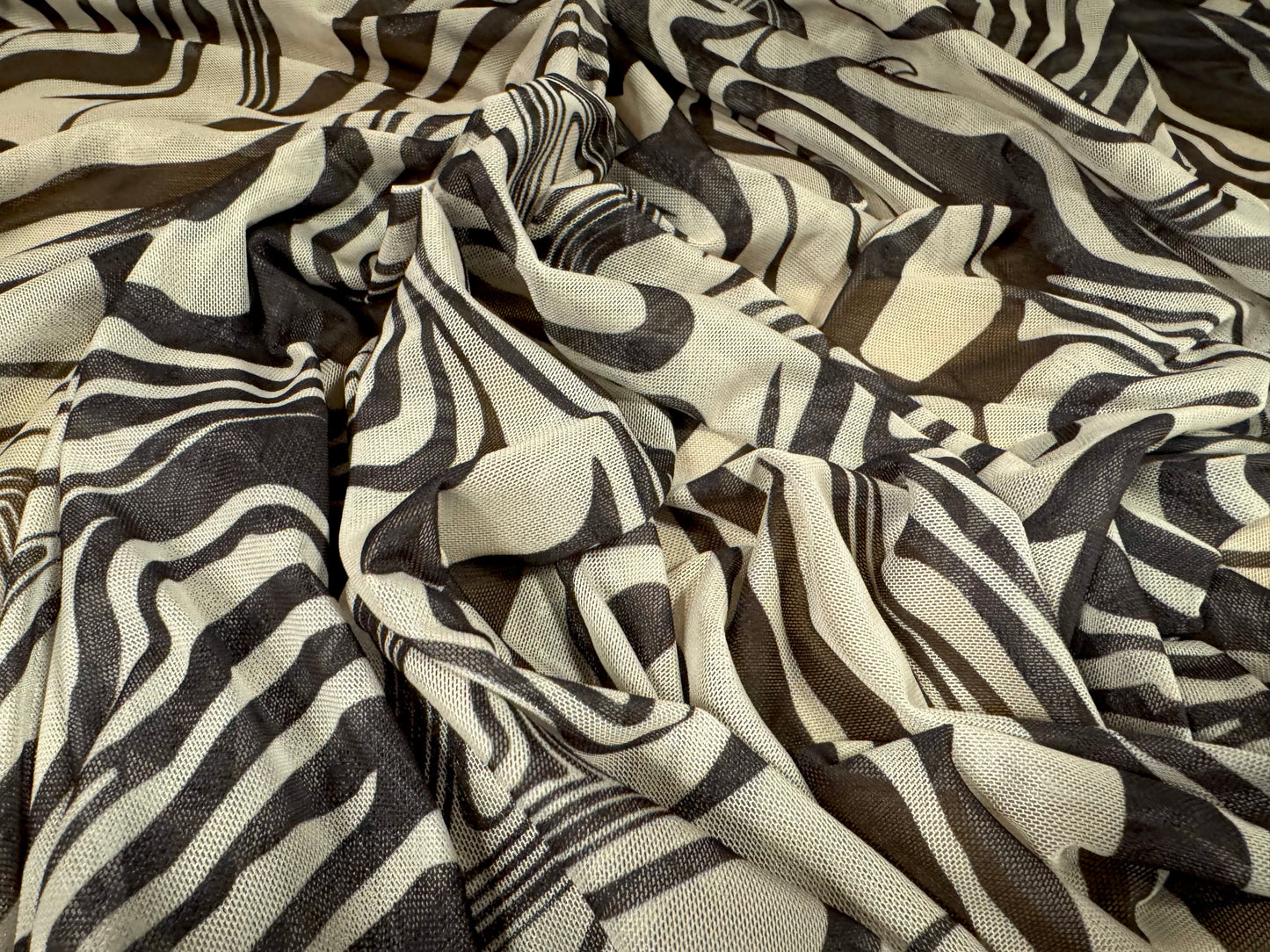 Power mesh net stretch spandex fabric, per metre - psychedelic zebra print - ebony & stone