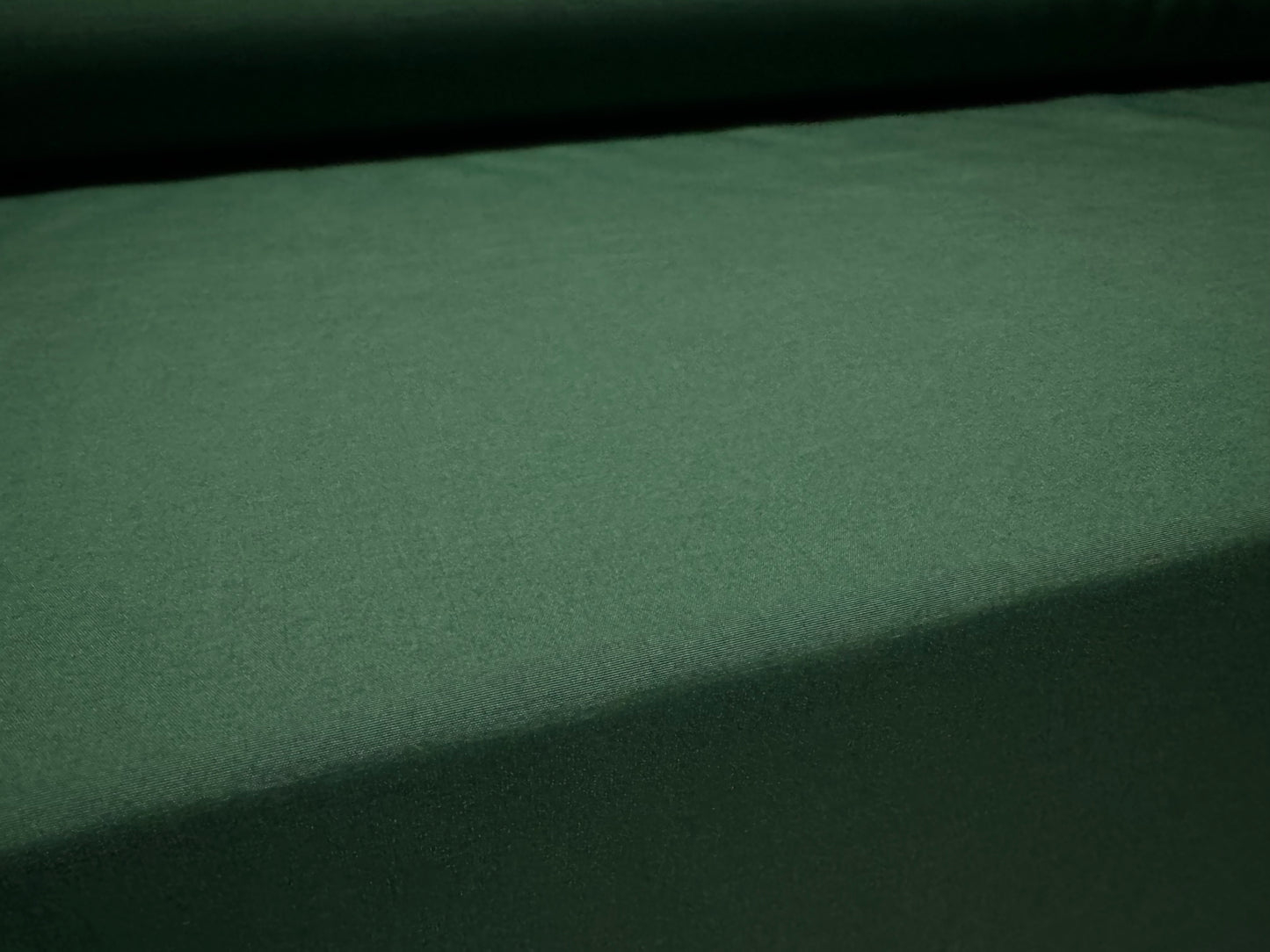 Plain weave trouser weight fabric, per metre - bottle green