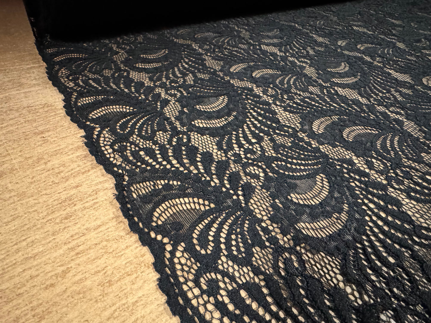 Stretch spandex lace dress fabric with scalloped selvedge, per metre - paisley - black