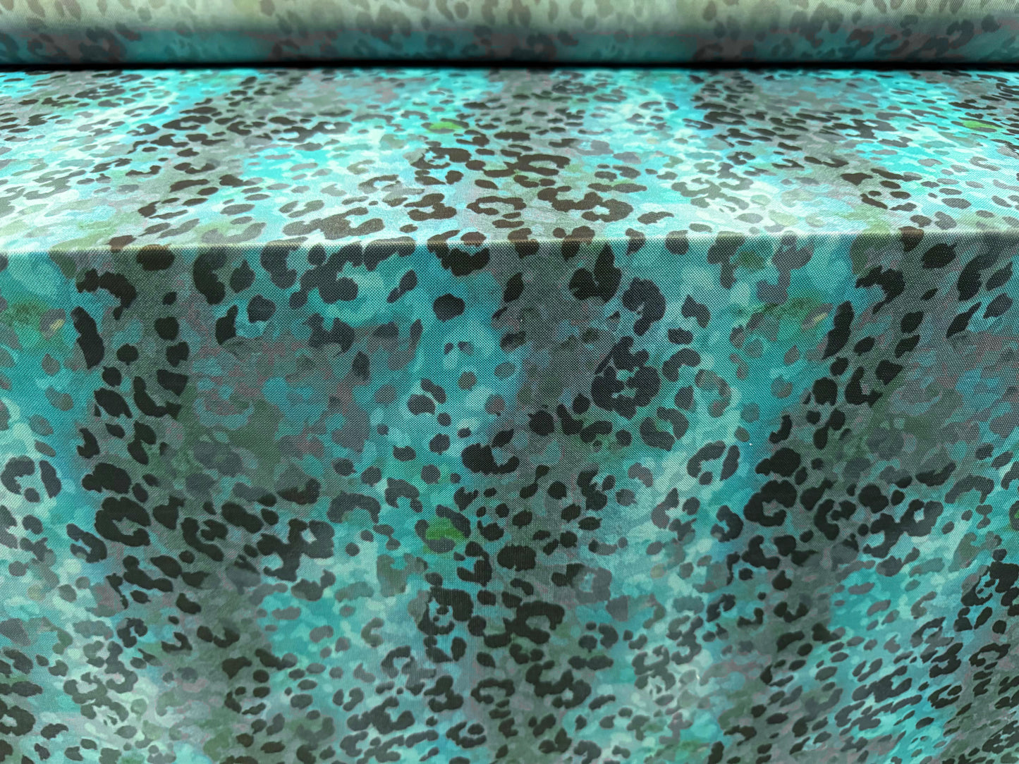 Power mesh net stretch spandex fabric, per metre - cheetah print - turquoise