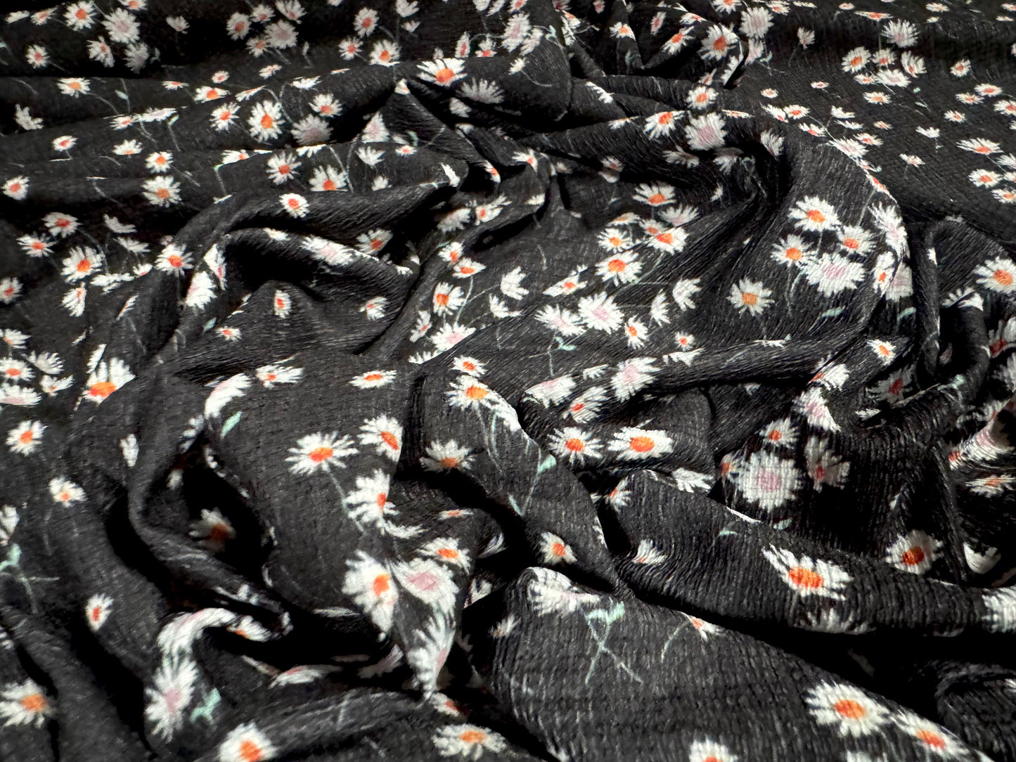 Stretch cheesecloth weave fabric, per metre - ditsy daisy flower print - black white & orange