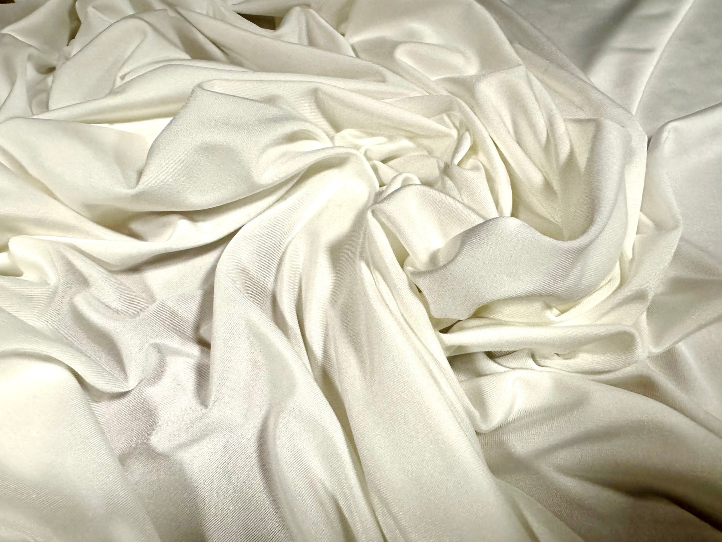 Soft touch spandex stretch jersey dress fabric, per metre - plain - ivory