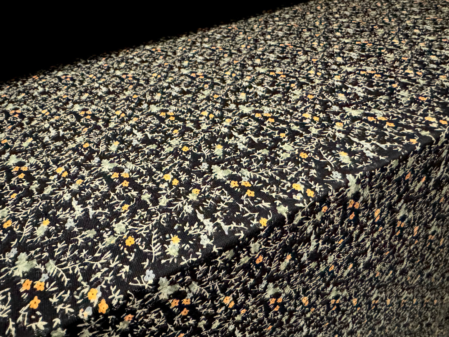Viscose spandex stretch single jersey fabric, per metre - small ditsy flower print - black sage & orange
