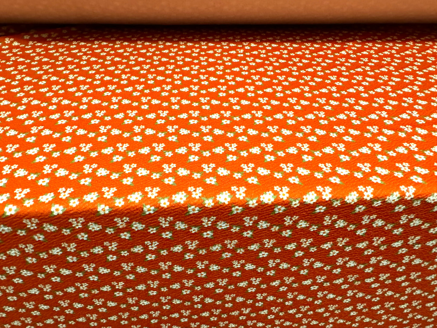 Waterfall textured scuba stretch spandex jersey fabric, per metre - ditsy flower print - orange