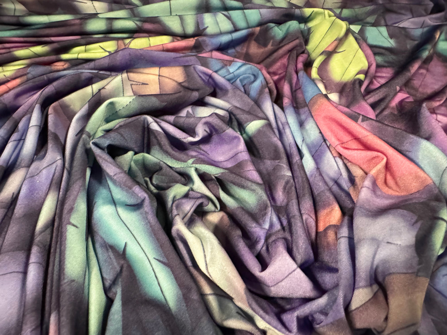 Soft touch stretch spandex single jersey fabric, per metre - stylised leaves print - multicolour