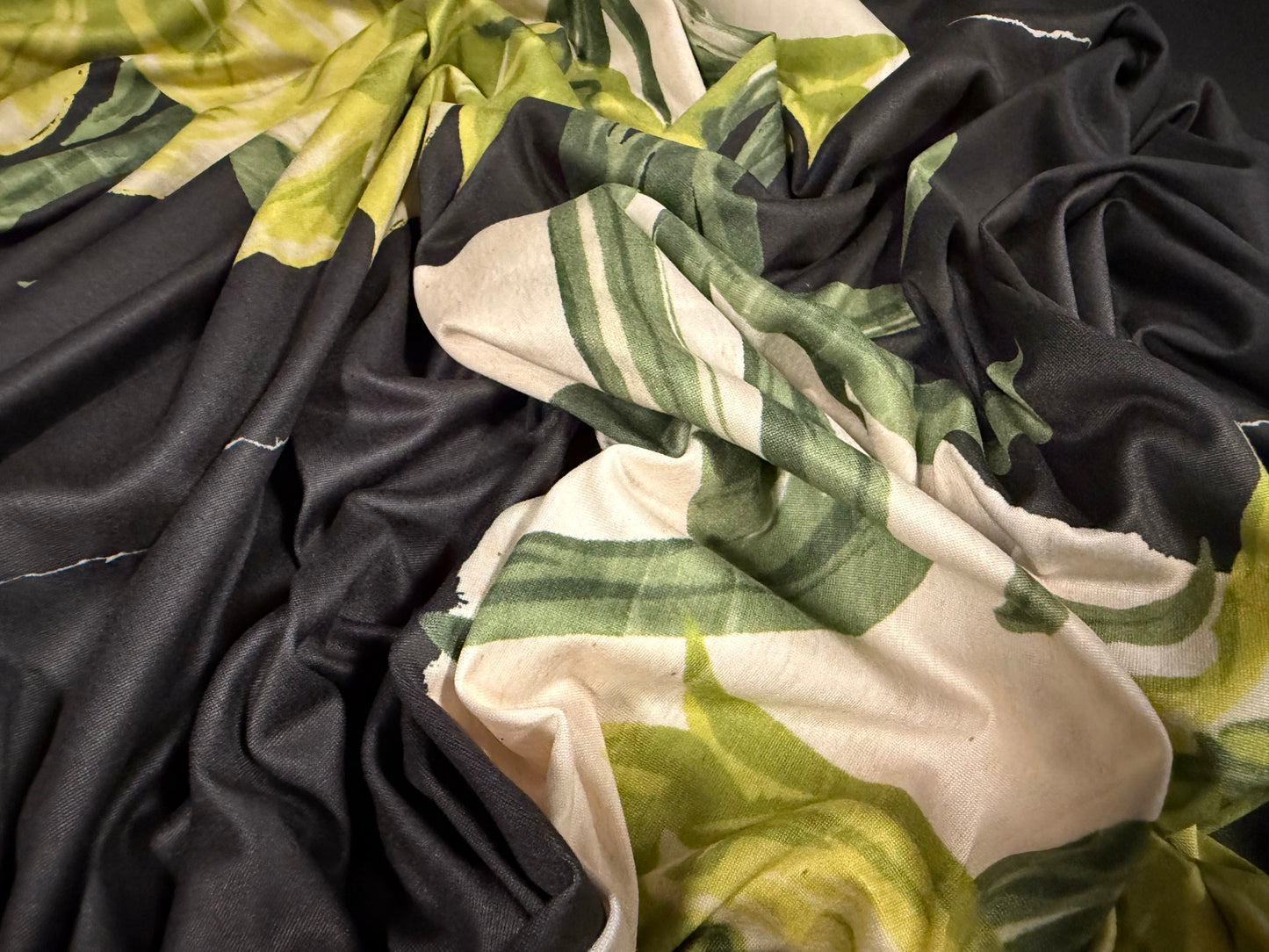 Super soft stretch single jersey fabric, per metre - lily floral print - black cream & green