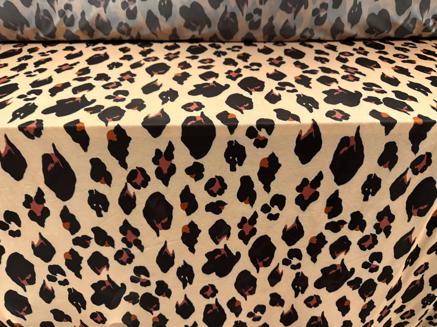 Power mesh net stretch spandex fabric, per metre - animal print - peach cream