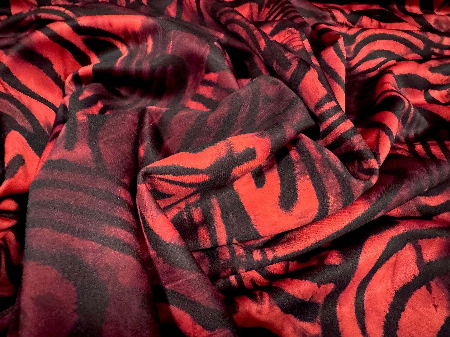 Scuba stretch spandex double jersey fashion fabric, per metre - distressed zebra print - red & black