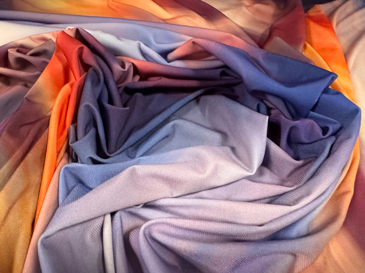 ITY stretch spandex single jersey fabric, per metre - high cloud sunset print - blue & orange