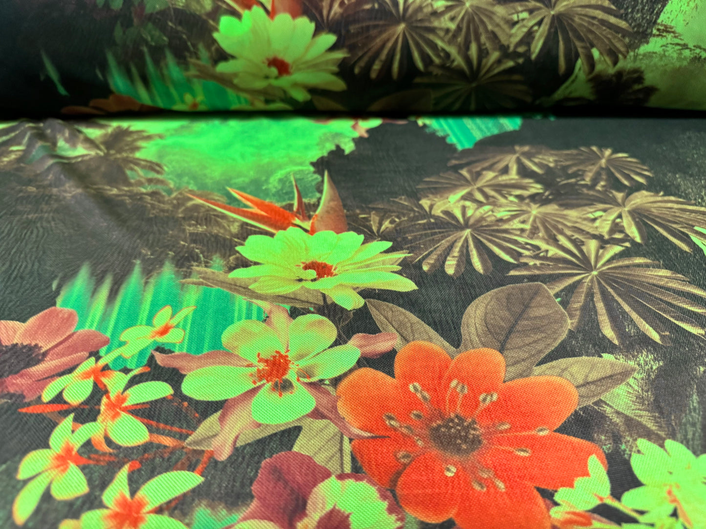 Power mesh net stretch spandex fabric, per metre - Hawaiian tropical paradise print - green black & orange
