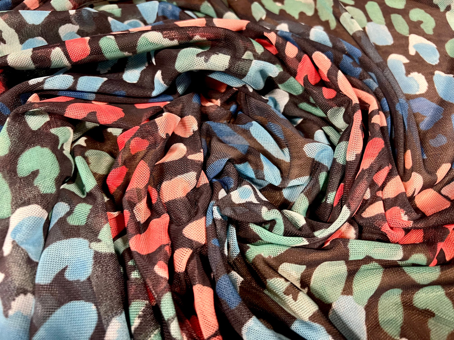 Power mesh net sheer stretch spandex fabric, per metre - abstract smudge print - black pink turquoise blue