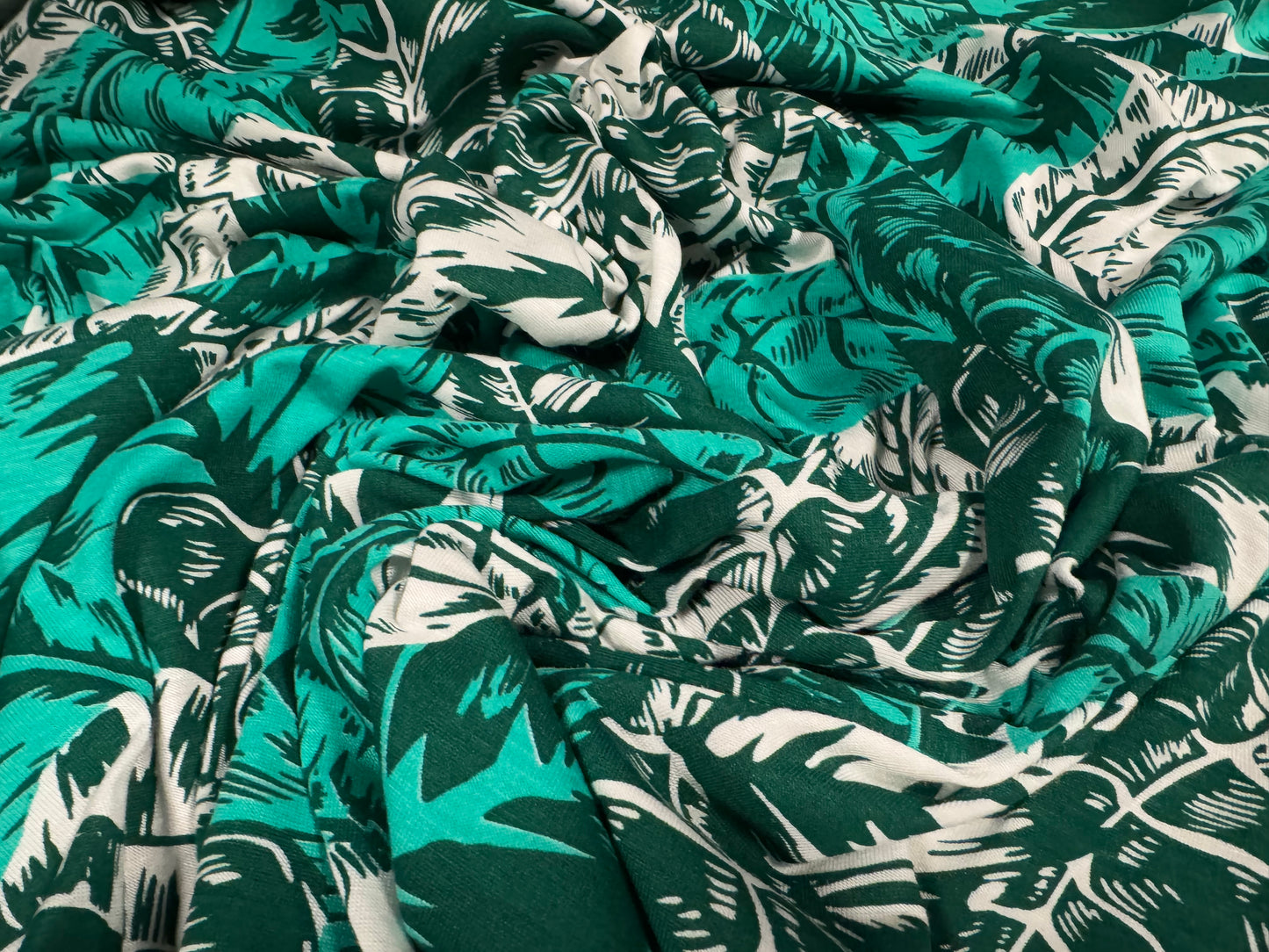 Viscose spandex stretch jersey fabric, per metre - palm leaves print - jade green