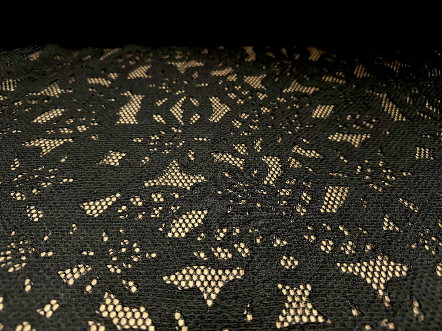 Fishnet scuba fabric with bonded floral appliqué, per metre - flower design - black