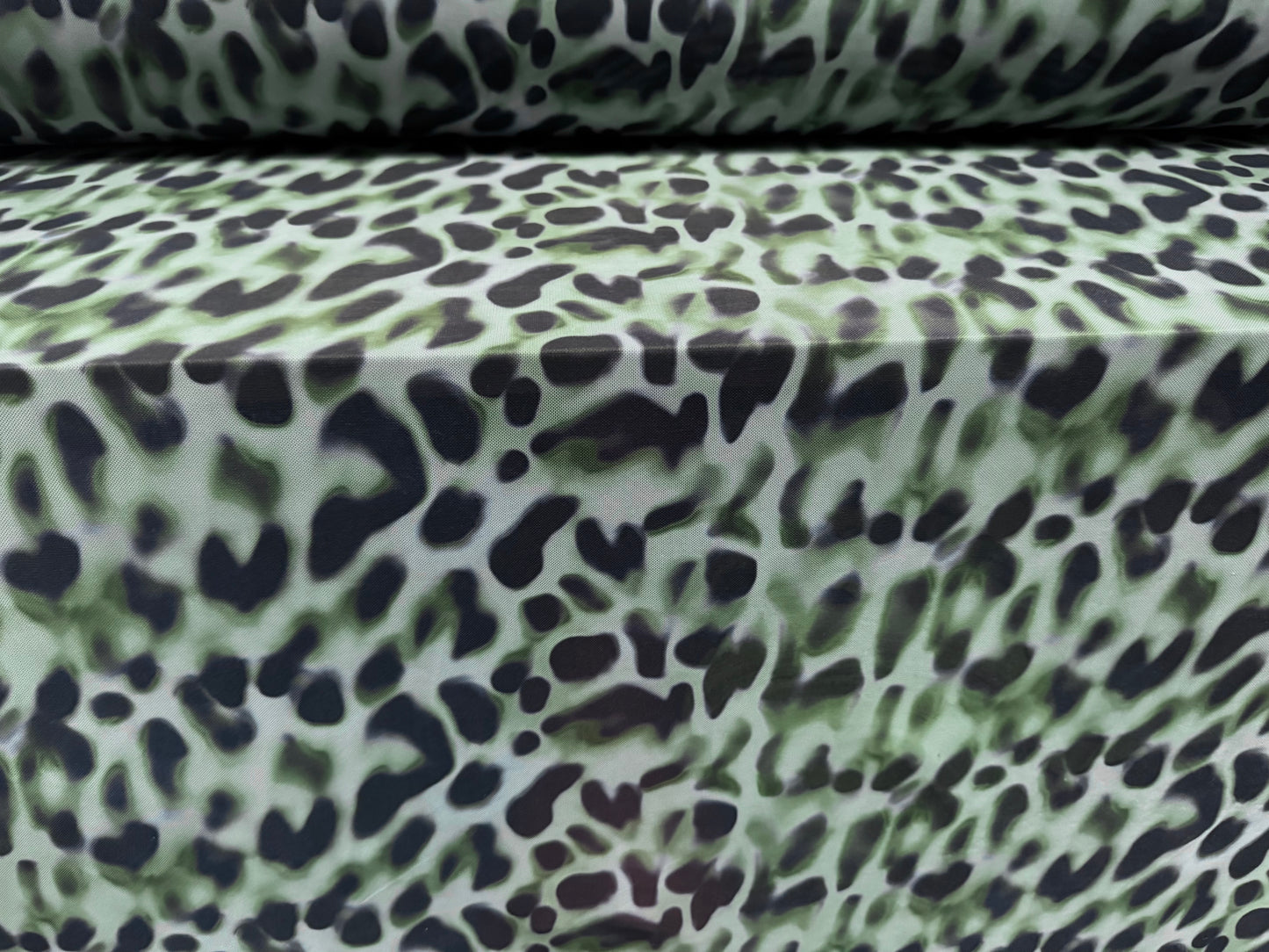 Power mesh net stretch spandex fabric, per metre - smudged leopard print - duck egg