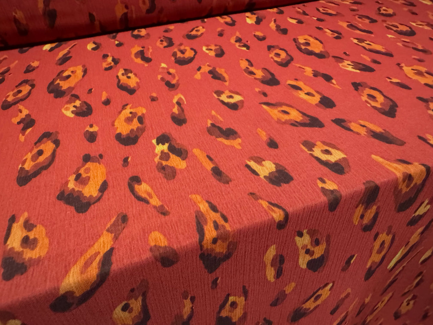 Chiffon yoryu woven dress fabric, per metre - distressed leopard print - red
