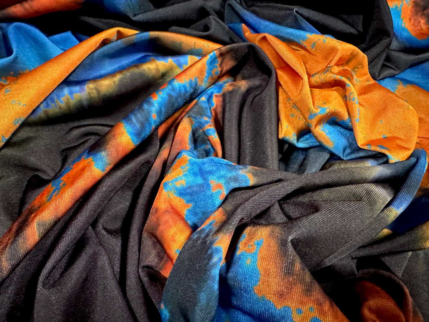 Disco stretch single jersey fabric, per metre - volcano ombré print - black blue & orange