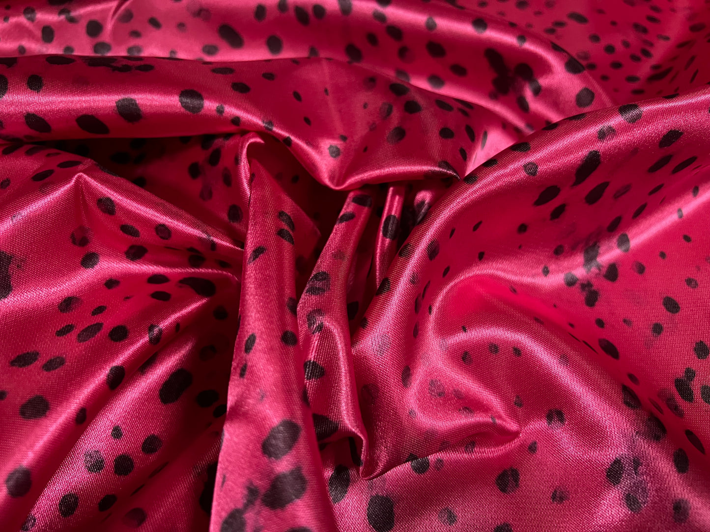 Silky Satin woven dress fabric, per metre - Dalmatian animal print - cerise pink