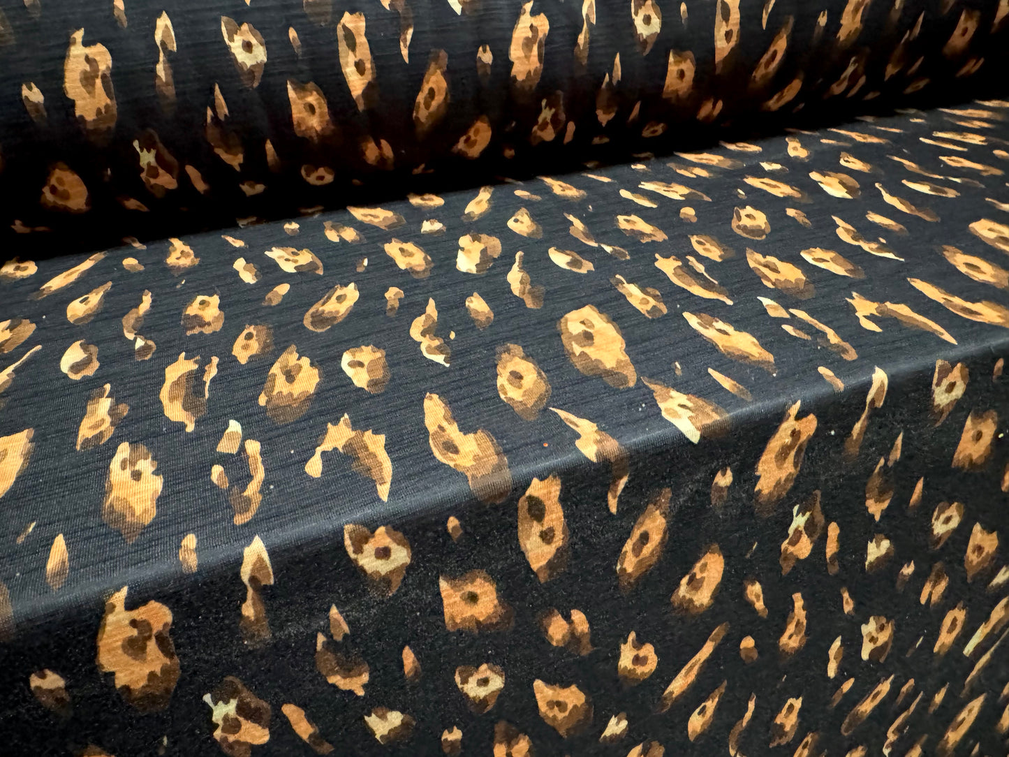 Single jersey fashion fabric with slub, per metre - animal print - black & peach