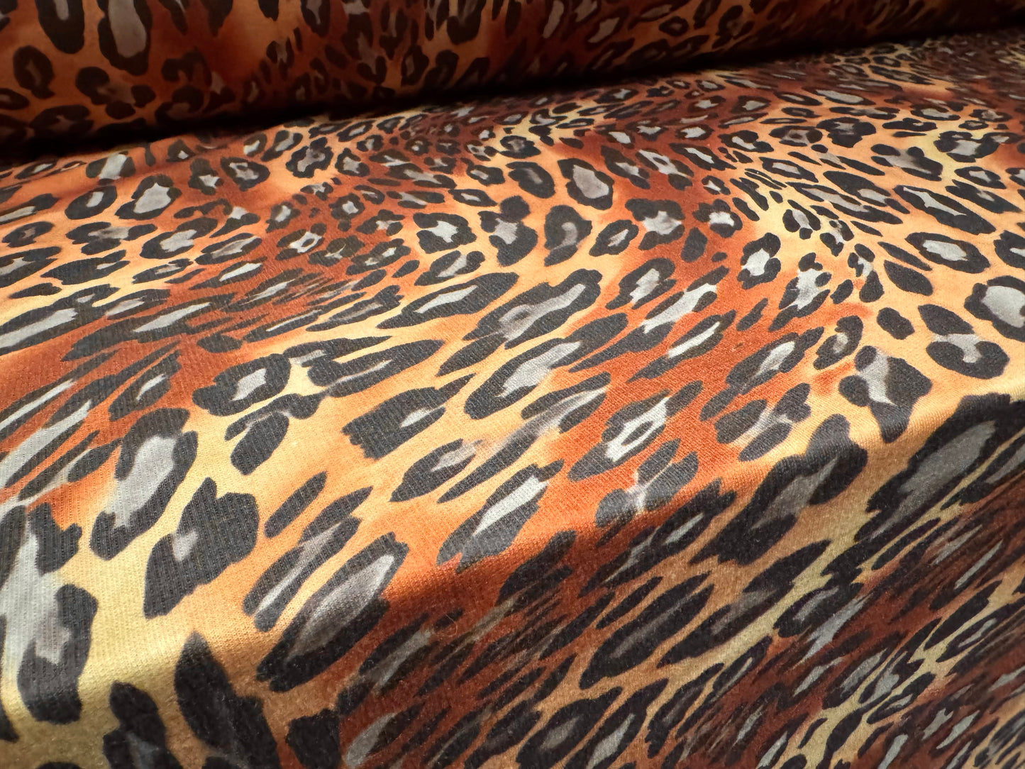 French Terry loopback sweatshirt jersey fabric, per metre - animal swirl print - brown & honey