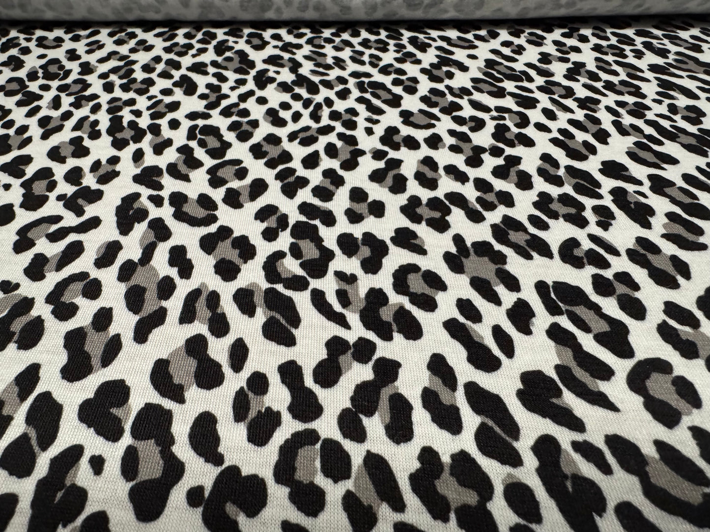 Soft handle single jersey fashion fabric, per metre - snow leopard print