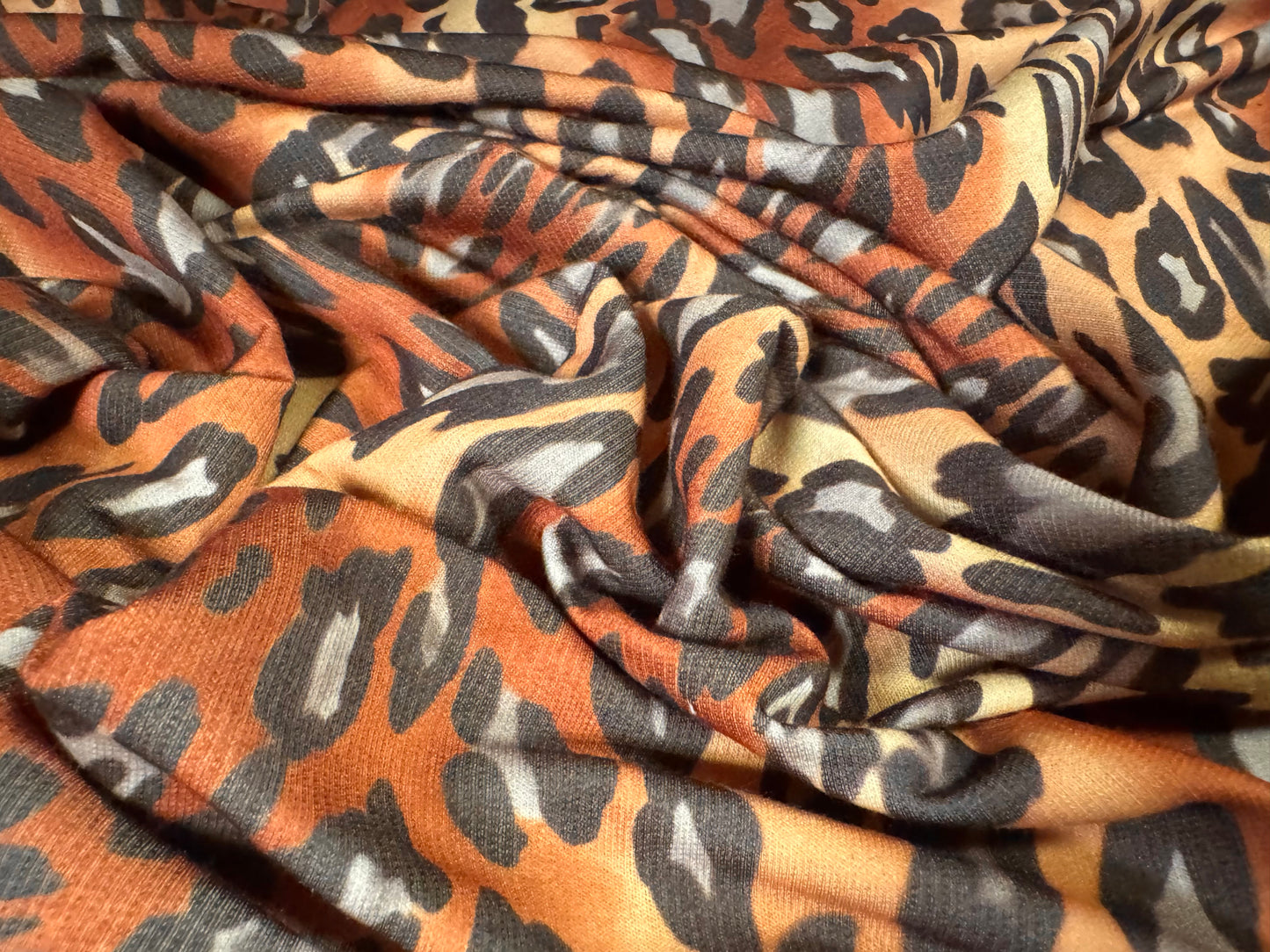 French Terry loopback sweatshirt jersey fabric, per metre - animal swirl print - brown & honey