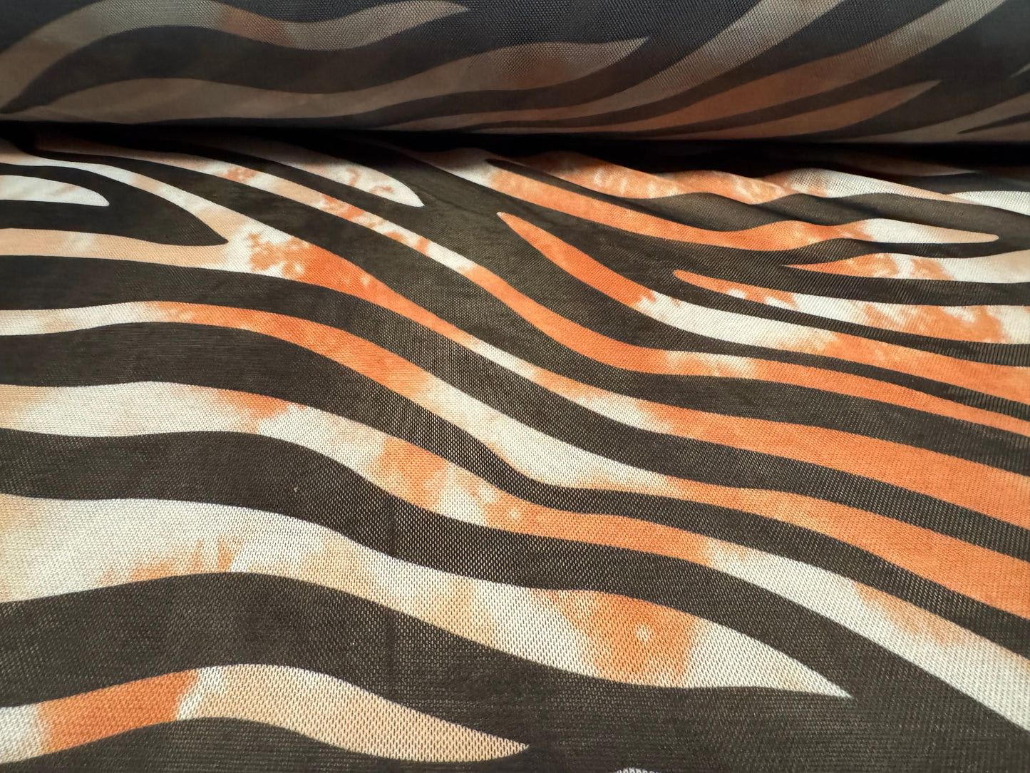Power mesh net stretch spandex fabric, per metre - zebra animal print - Orange & black
