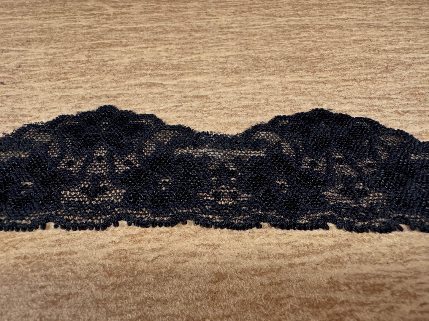 Stretch lace edging trim fabric with scalloped selvedges, per metre - floral - black
