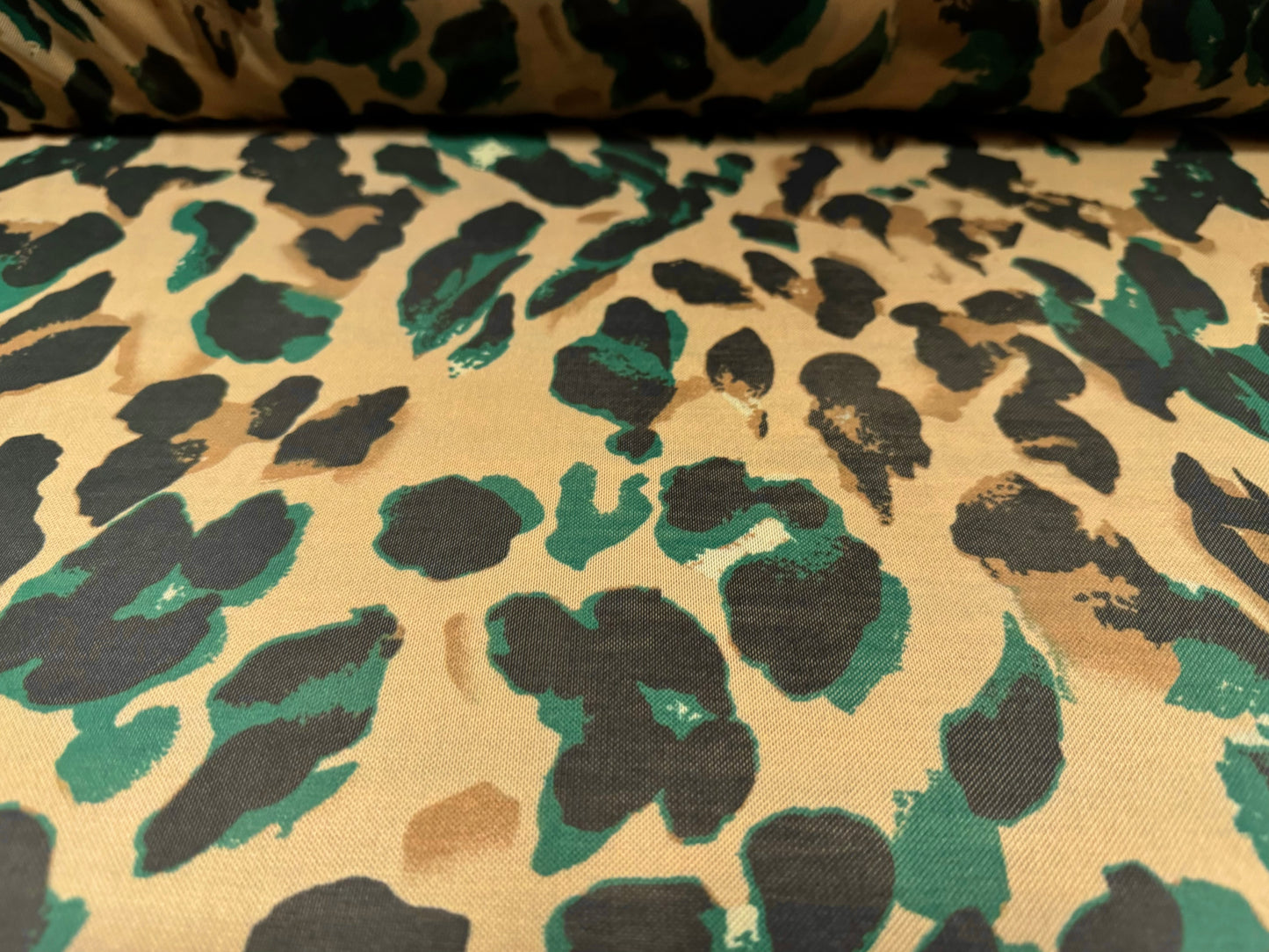 Power mesh net stretch spandex fabric, per metre - stylised animal print - beige & emerald green