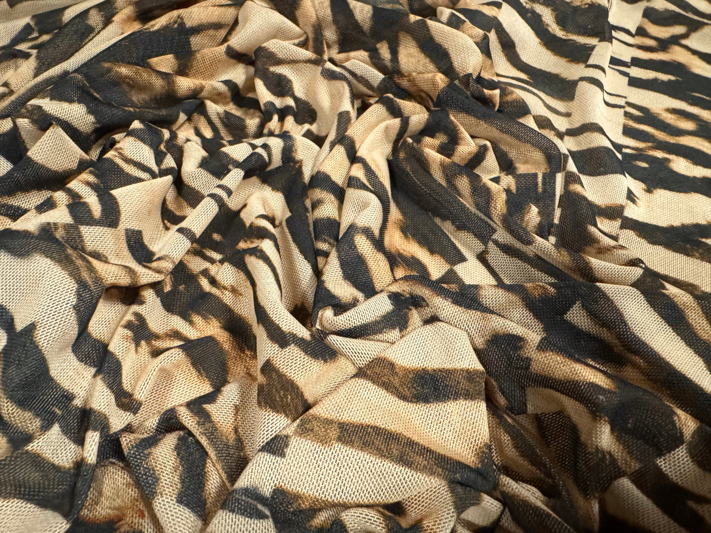 Power mesh net stretch spandex fabric, per metre - stylised animal print - beige