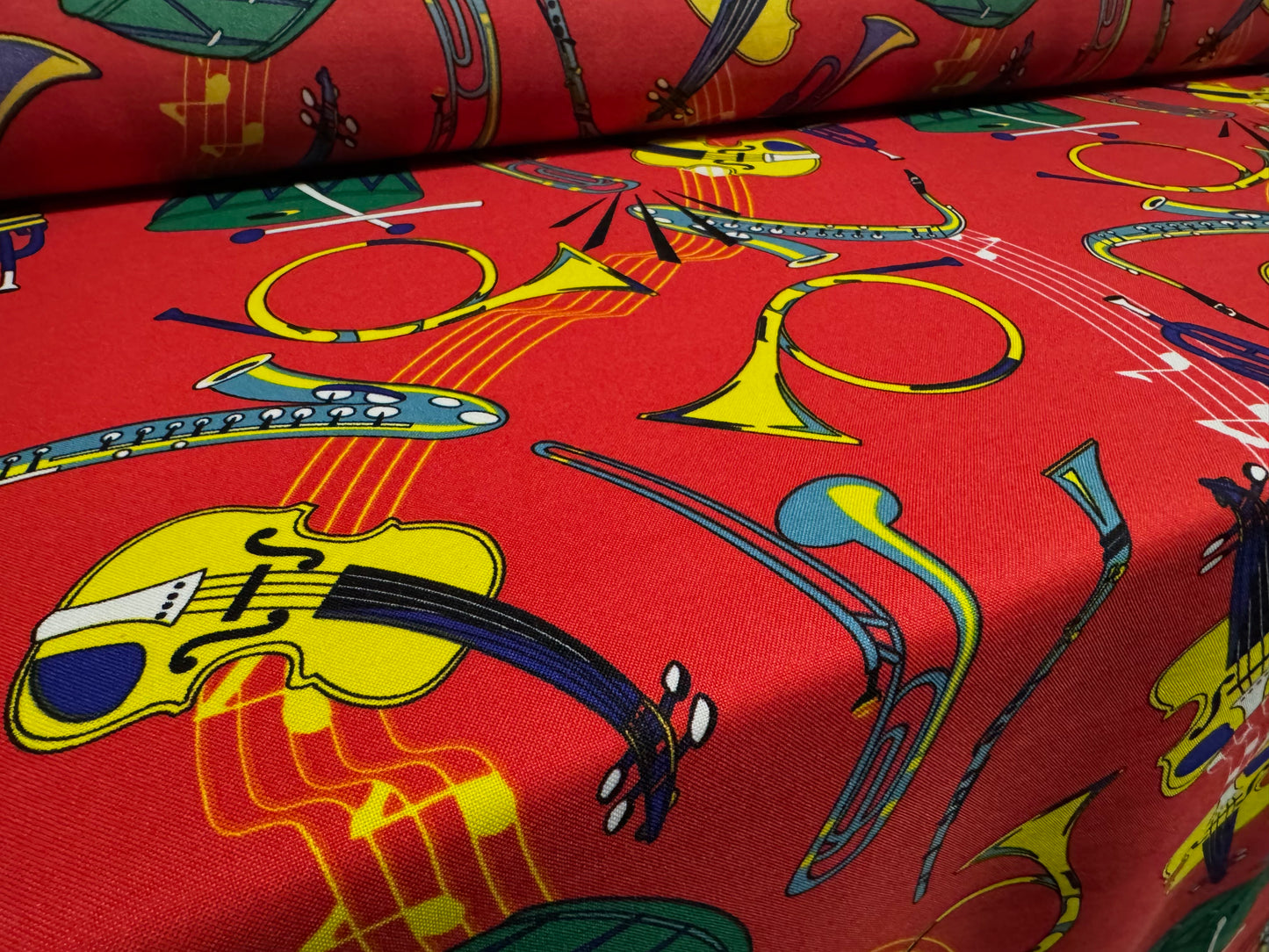 Woven Panama fashion fabric, per metre - musical instruments print - red
