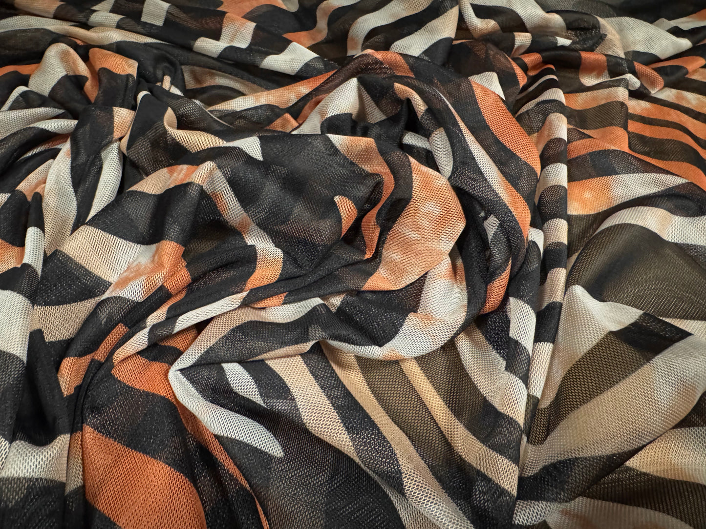 Power mesh net stretch spandex fabric, per metre - zebra animal print - Orange & black