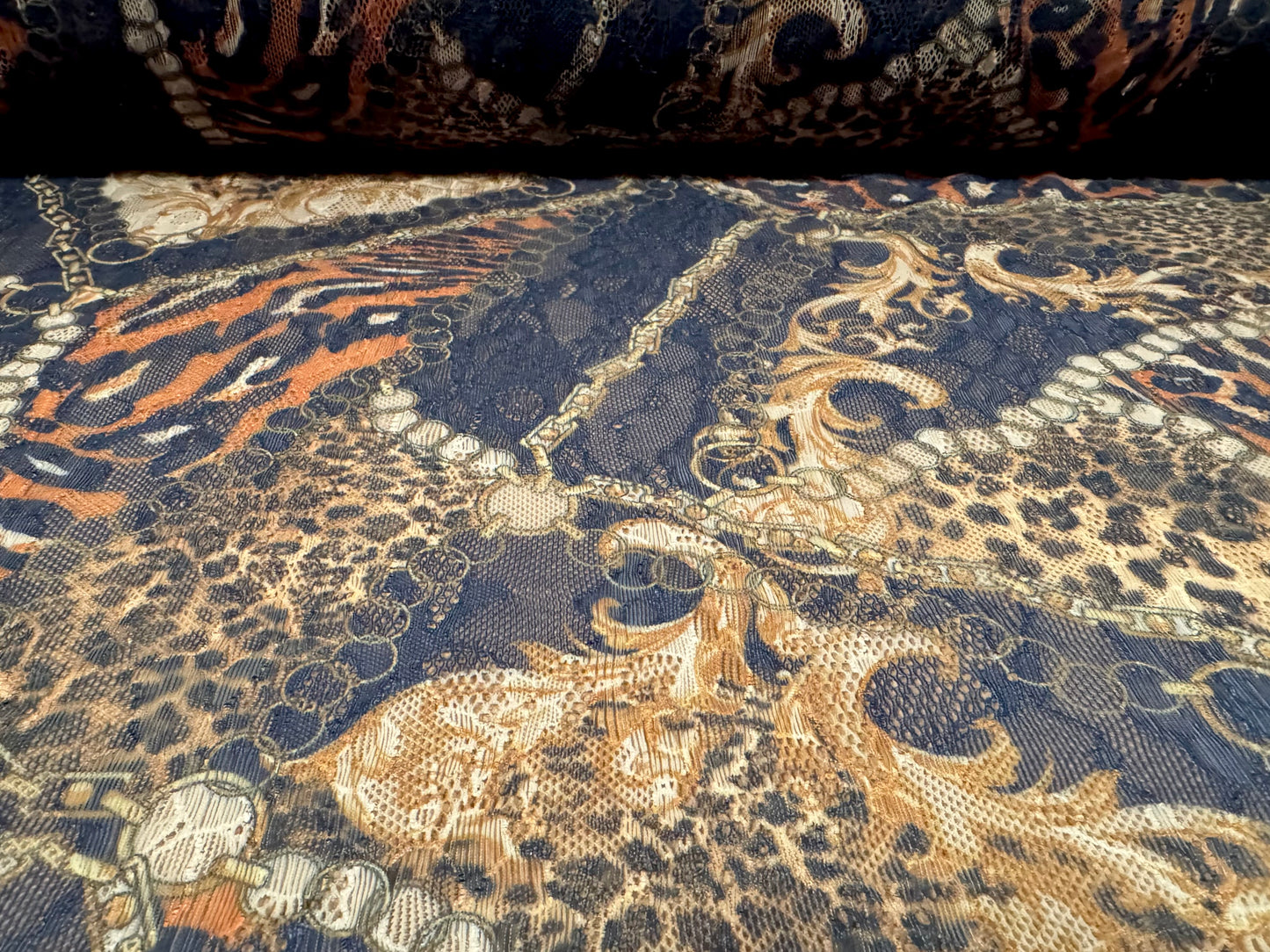 Stretch spandex lace fabric, per metre - leopard & chains print - black gold & orange